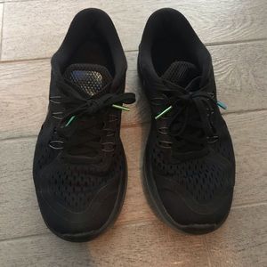 Black with metallic Nike check sneakers